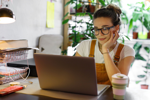 Young,Female,Gardener,In,Glasses,Using,Laptop,,Communicates,On,Internet egg donation single lady